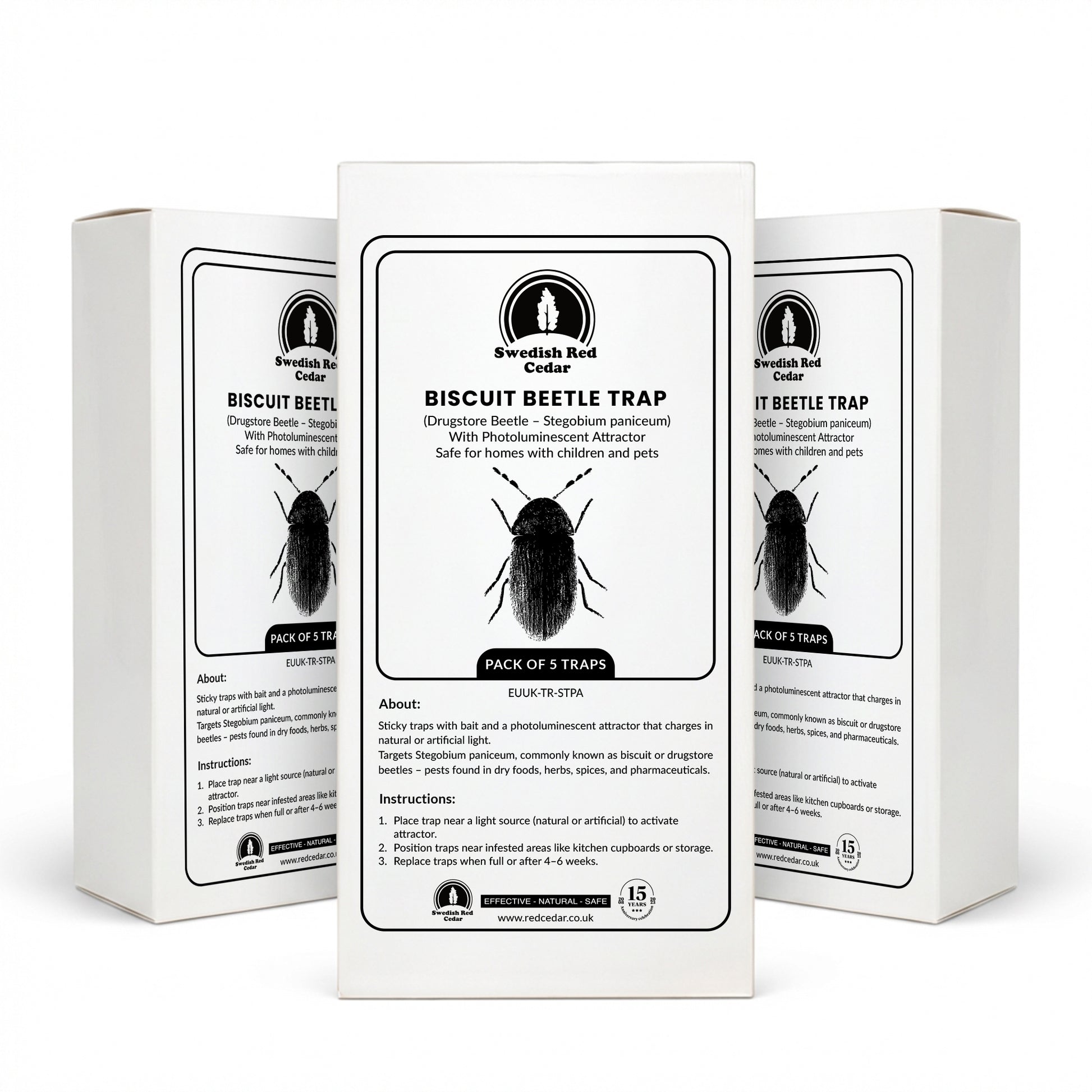 Three boxes of Swedish Red Cedar Biscuit Beetle Trap on a white background