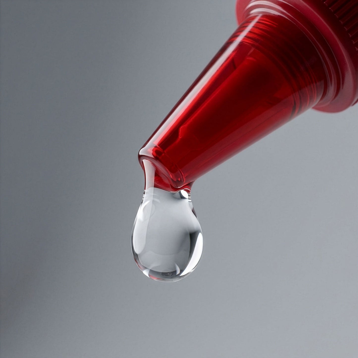 Red cedar oil drop applicator showing natural oil texture
