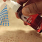 Someone spraying red cedar oil on the floor.
